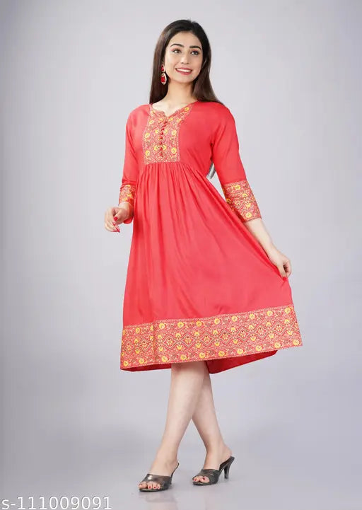 Coral red rayon ethnic print Anarkali short kurti with three-quarter sleeves, button closure, and flared hem - Indian fashion