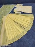 Yellow and gold dupatta set, likely satin, trendy design