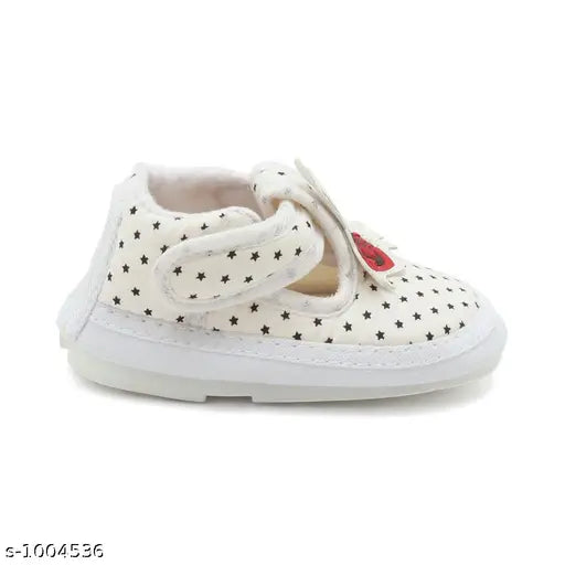 White multicolored boys booties with laces and stars