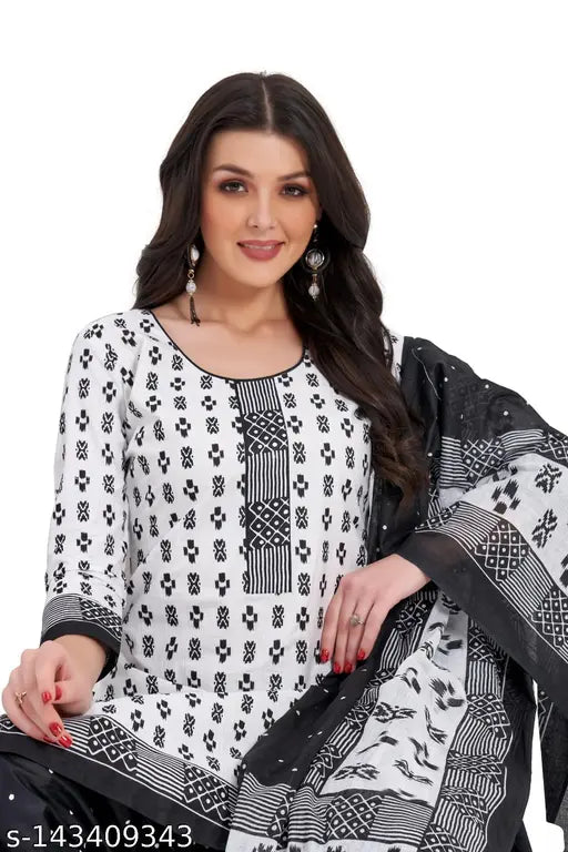 Female model wearing a black, white and silver embroidered salwar suit with dupatta set