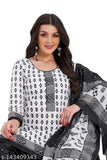 Female model wearing a black, white and silver embroidered salwar suit with dupatta set