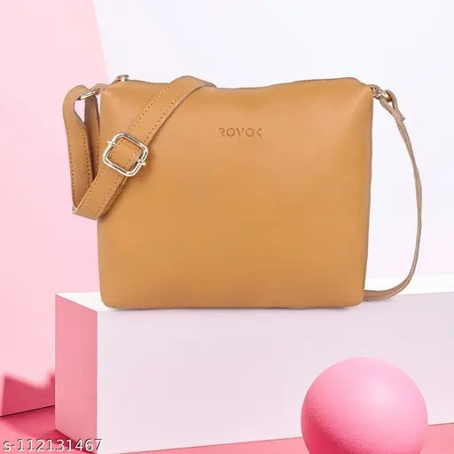 A stylish sling bag with tan leather texture and a visible shoulder strap