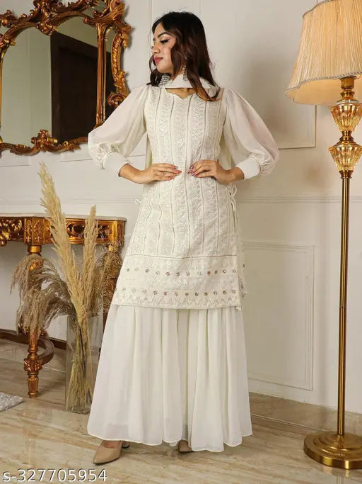 Embroidered Georgette Kurta & Sharara Set with sequin embellishments, side tie-ups, and matching dupatta. Indian women's fashion on display