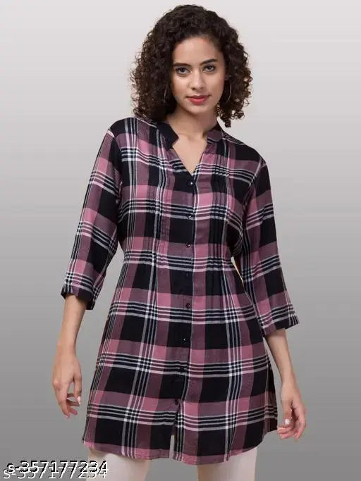 Black cotton checkered tunic by Inuka from Hive91, 3/4th sleeves, V-neck, button front, mandarin collar. Ideal for casual wear with white jeans. Made in India