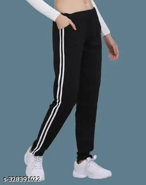 Black Adidas track pants, elastic waistband, cropped leg