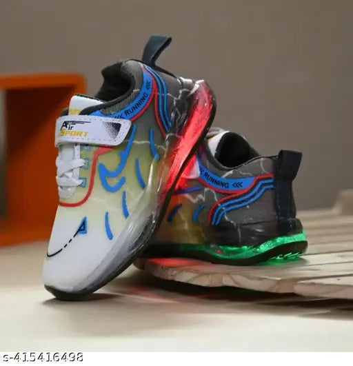Blue and white children's sneakers with glow-in-dark soles