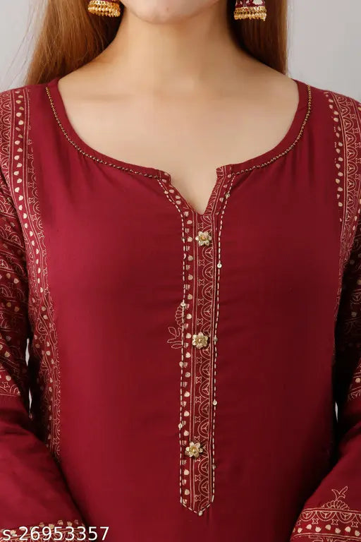 Refined rayon kurta set with palazzo bottoms, three-quarter sleeves, printed net pattern for women. Indian made fashion on display