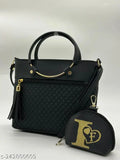 Black leather sling bag with a long strap and gold zippers