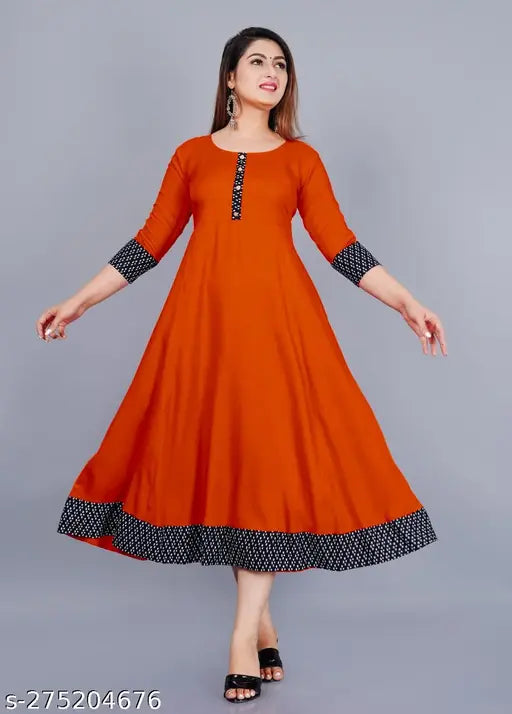 Orange rayon round pleated flared kurti with three-quarter sleeves, hand wash or machine washable