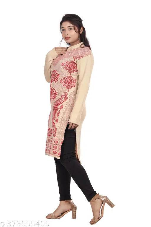 A woman in a beautyful woolen kurta with an intricate paisley design