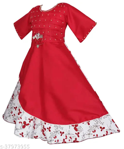Red, sequined girl's dress with white floral trim