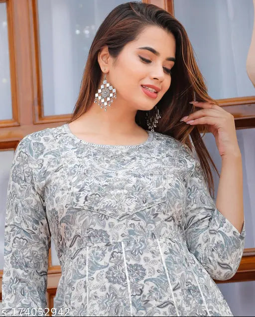 Stylish grey rayon embroidery gown, perfect for parties & festivals. High-quality Indian-made women's embroidery kurti with 3/4 sleeves