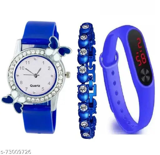 The image shows a new analog watch with a butterfly design intended for girls, set against a blue fabric background. It is styled in white and features a clear strap embellished with multiple small decorative stones and crystals