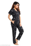 Black cotton printed night suit for women, featuring short sleeves and lace detailing. Soft quality cotton fabric for comfort and style. Ideal bedroom wear as a thoughtful gift. Made in India