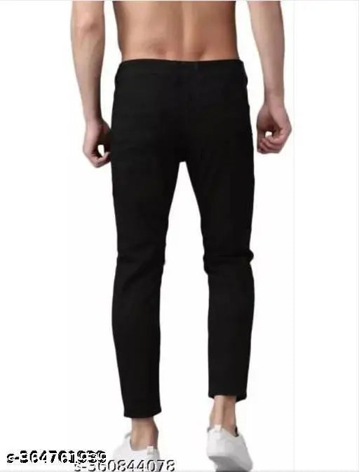 Black denim men's knee-cut jeans, solid pattern from Shriradhe Enterprises. Perfect fit for any occasion