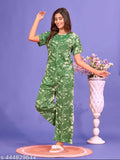 Imported polyester printed nightsuit combo pack for women, loose-fitting for easy movement and comfort during sleep. Features adjustable straps and elastic waistband. Cotton-like feel, breathable fabric. Made in India