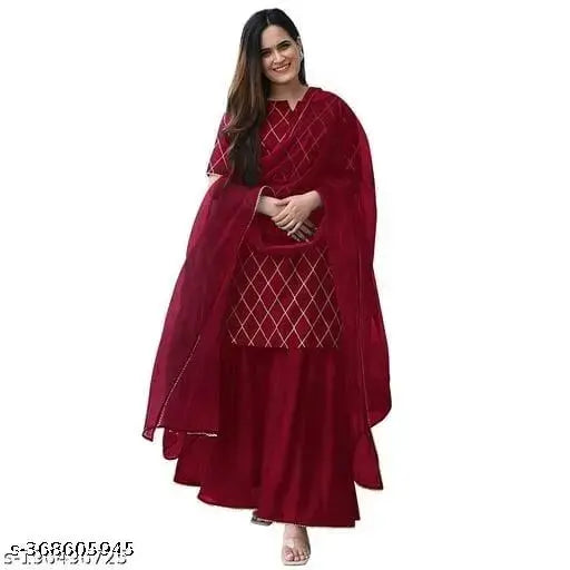 Red rayon round neck kurta with sharara and net dupatta set