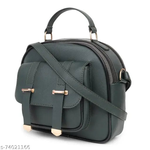 Women's side sling tassel handbag with adjustable strap. Black leather with gold accents. Latest fashion accessory
