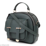 Women's side sling tassel handbag with adjustable strap. Black leather with gold accents. Latest fashion accessory
