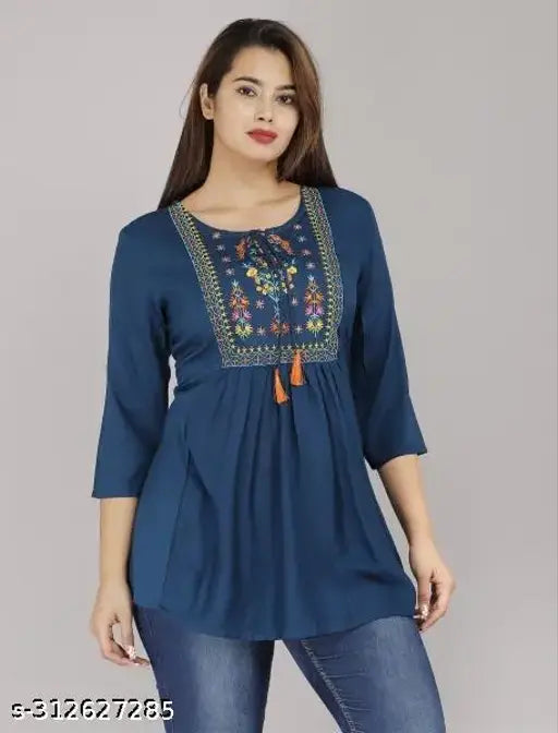Teal blue rayon short kurta, embroidered three-quarter sleeve top for women, latest trending fashion from Suraj Pari Singh, originated in India