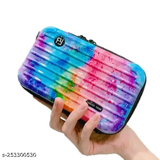 A multi-colored, rectangular mini suitcase with a closure that appears to be a flap on top