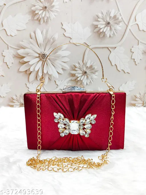 Red velvet clutch purse with butterfly embellishment, golden chain strap