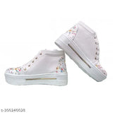 White EVA PVC embellished shoe for kids (4-9 years), Indian origin on display