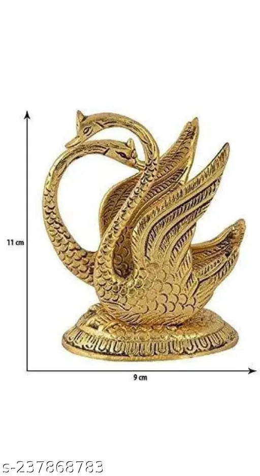 Shine Golden antique swan napkin holders, handcrafted metal figurines for table decor, hotel shop, office and gifting. Dimension: 10x8x11 cm each. Indian artisan work with bright colors and antique finish