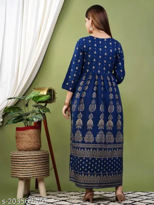 Royal blue rayon dress with intricate floral designs on long sleeves and hem