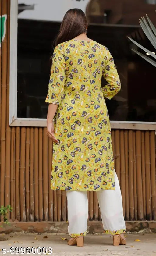 Rayon printed kurta set with palazzos, three-quarter sleeves, vibrant Indian pattern