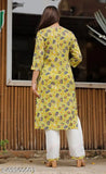Rayon printed kurta set with palazzos, three-quarter sleeves, vibrant Indian pattern