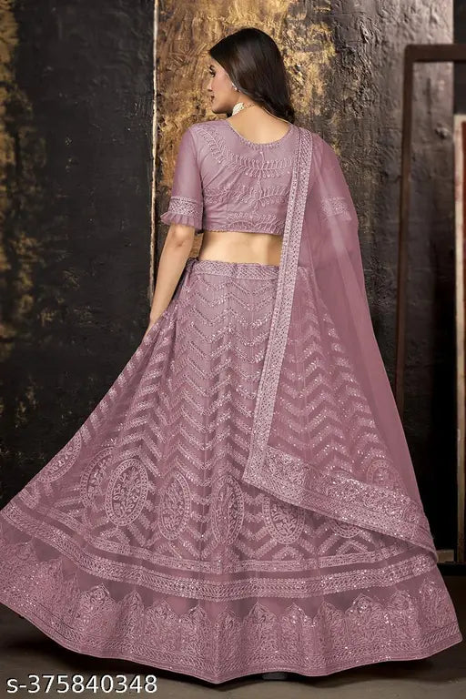 Pink net embroidered lehenga choli and dupatta set with ethnic motifs, semi-stitched (Lehenga waist size: 44in, Lehenga length: 42in, Dupatta length: 2.25in), from India