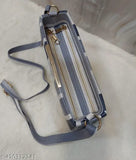 Purse with striped lining and multiple pockets, navy blue with gold hardware