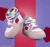 Children's shoe with red and pink hues, featuring white laces and a black label