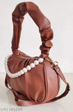 Coral pink satin fabric girls' slingbag with a handle, featuring a detachable shoulder strap