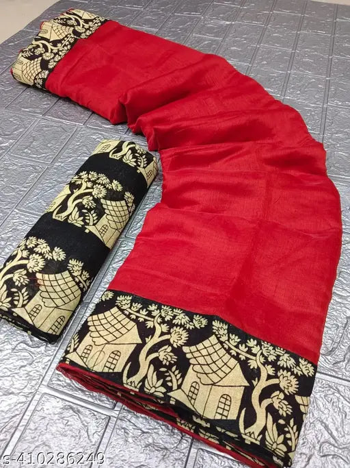 The image displays a cotton and silk saree with red and black trim, laid out on what appears to be metallic foil or paper