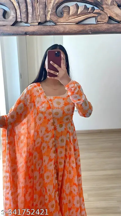 Orange floral rayon maxi dress with dupatta, long sleeves, elegant design.