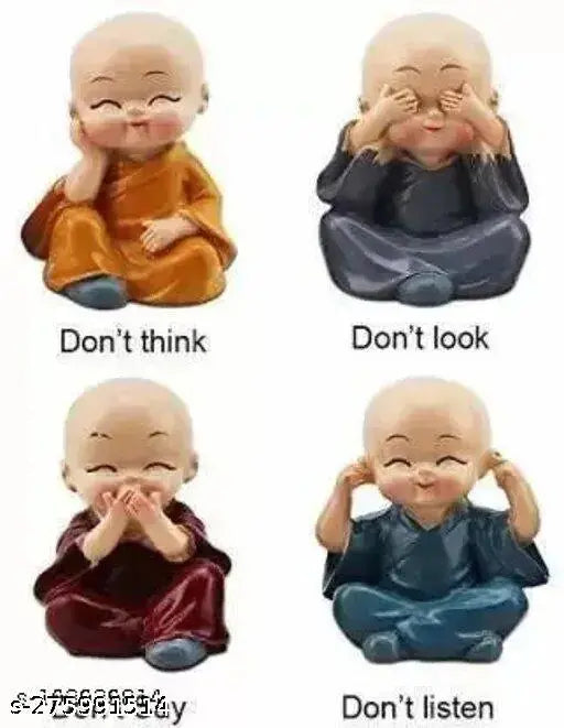 Multicolored polyresin baby monks with varied poses and expressions