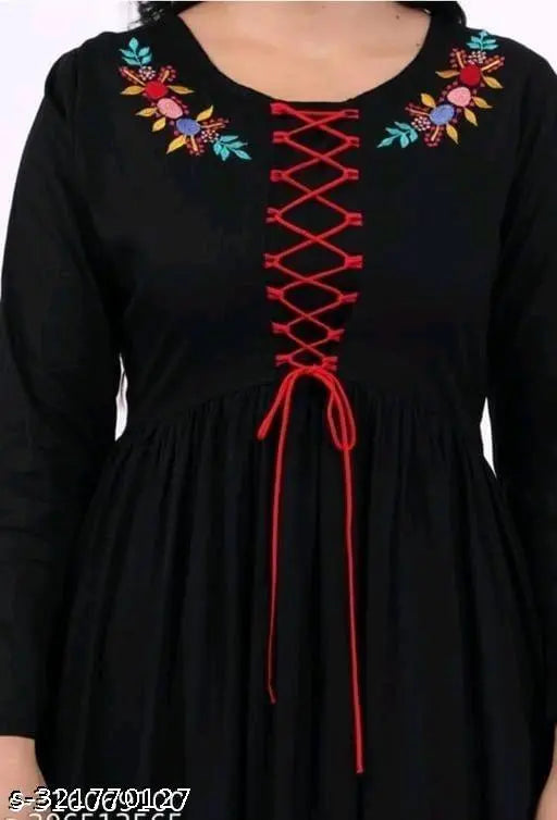 Black cotton long-sleeve naera embroidery, quality Indian clothing for women with solid pattern on display