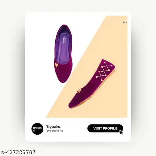 Black embroidered ballet flats with gold accents, embellished toe box