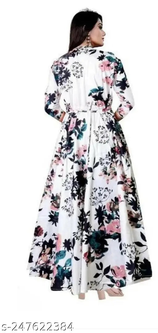 White rayon Anarkali printed gown with three-quarter sleeves, featuring white flower print design. Perfect for girls' fashion and daily wear. Indian-origin Anarkali dress