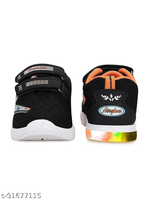 Black sneakers with neon blue stripes, LED lights, and white soles
