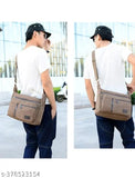 This is an image of a person wearing a black cap, standing on a sidewalk next to a building. The person is holding what appears to be a canvas cross body bag with multiple pockets, in front of them. The bag has straps and a flap closure, and there's visible stitching. It features the text "Momisy" printed on it