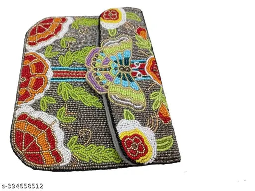 Beaded purple and black clutch purse with floral embroidery, gold accents and 2 functional pockets