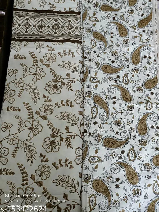 Brown and white paisley pattern on fabric