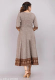 A brown anarkali kameez with embroidered details