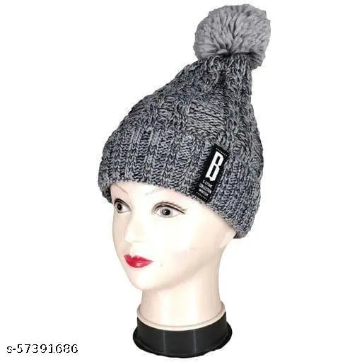 Navy wool beanie with fur-lined pompom, warm and snow-proof for women and girls
