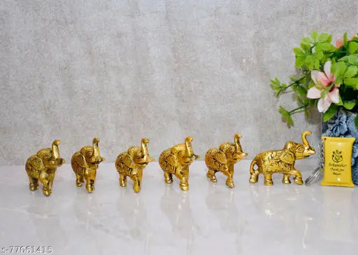 Gold metal Indian elephant figurine set (6pcs, 8cmL x 6.5cmH x 4cmW), symbolizing wisdom and power for home decor