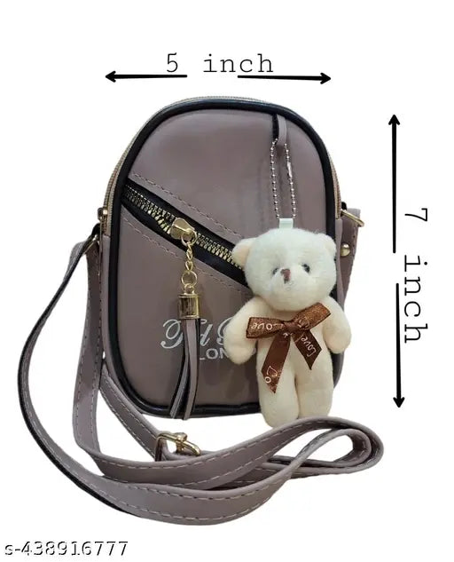 Purse with stuffed animal, brown shoulder bag
