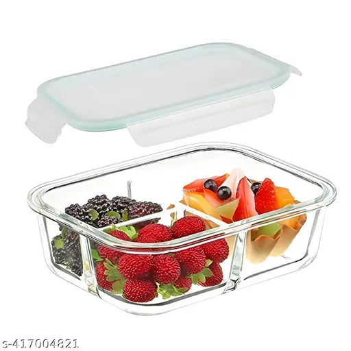 Clear plastic lunchbox with multiple compartments, each containing a different food item